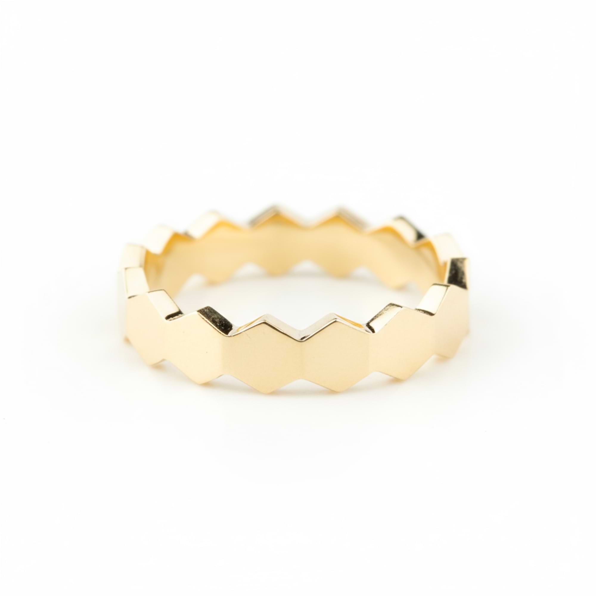 14k Gold Honeycomb-patterned ring on a white background