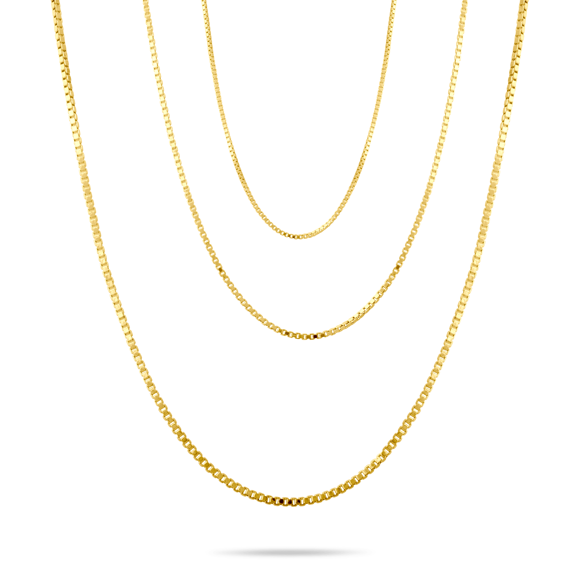 Three 14k gold box chains of different thicknesses on a transparent background