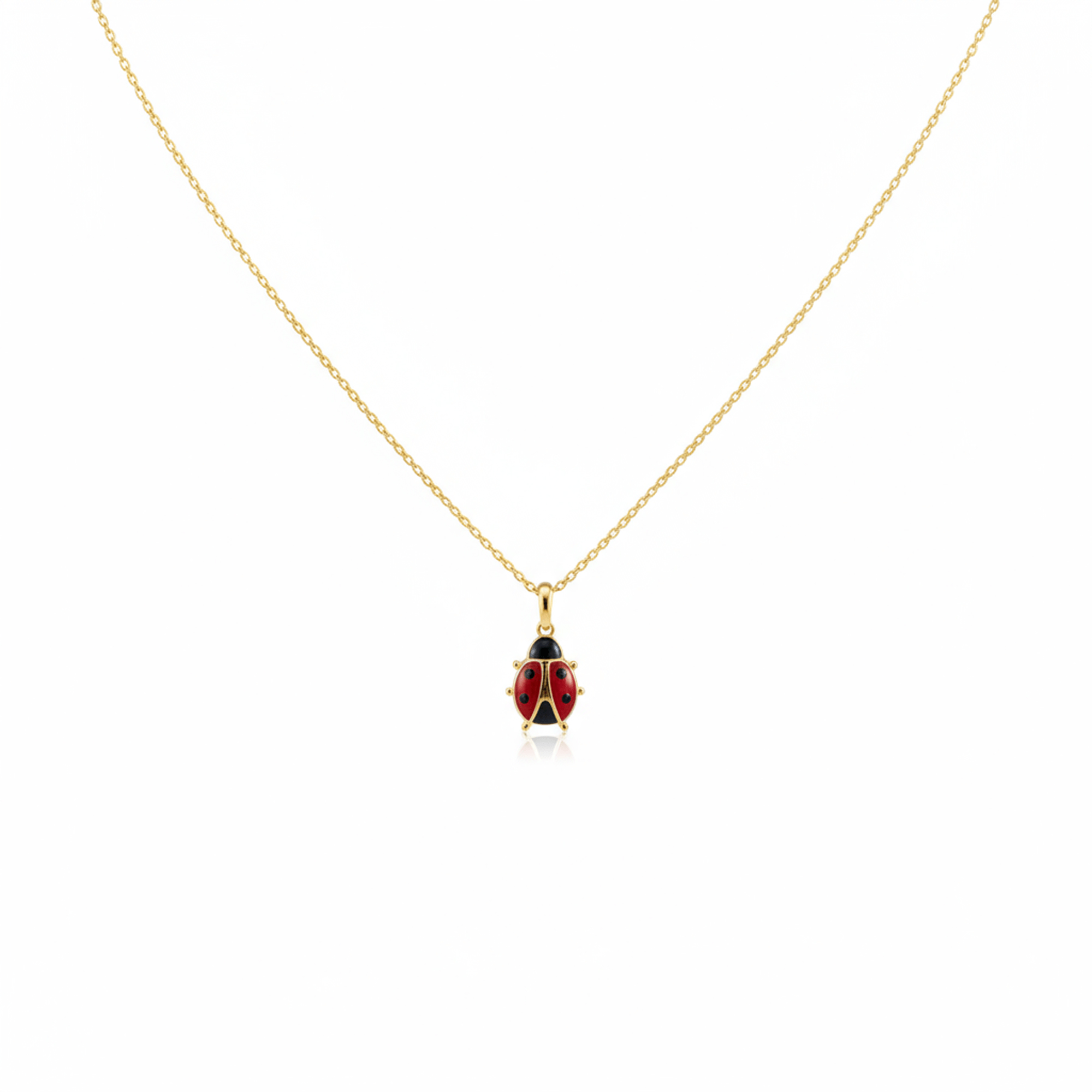 14k Gold necklace with a ladybug pendant on a white background