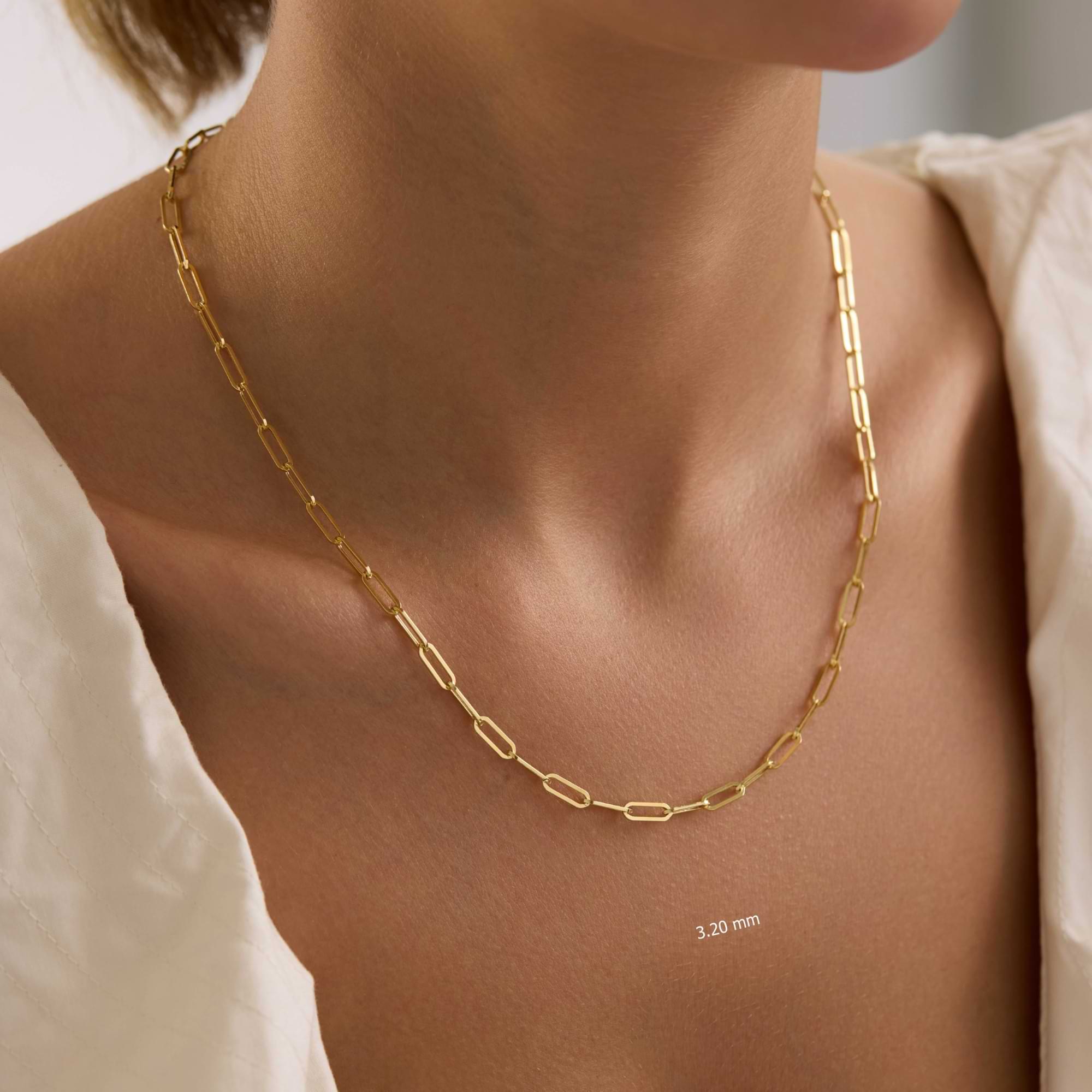 14K Gold 3.2mm Paperclip chain necklace on a person.