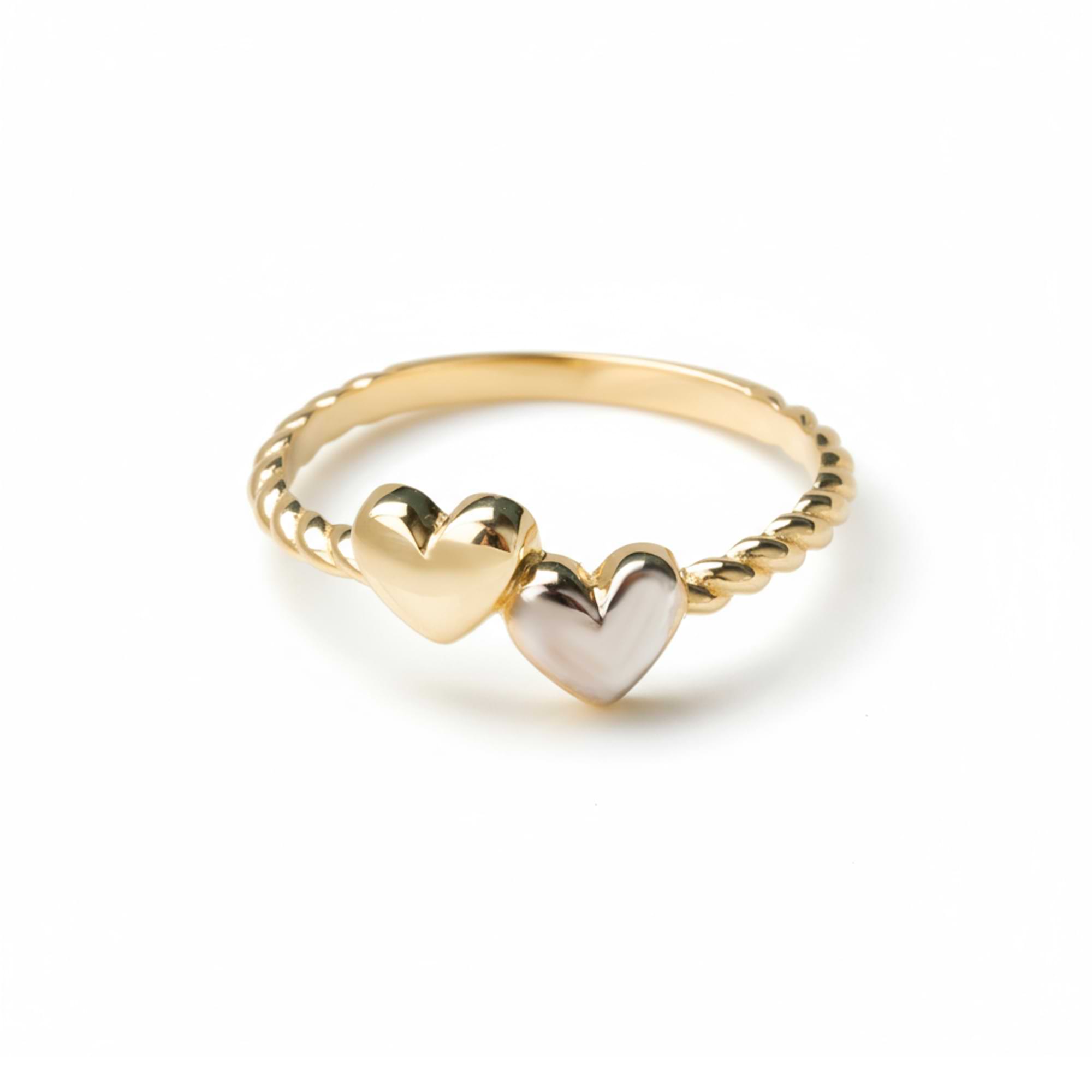 14k Gold ring with a heart-shaped charm on a white background