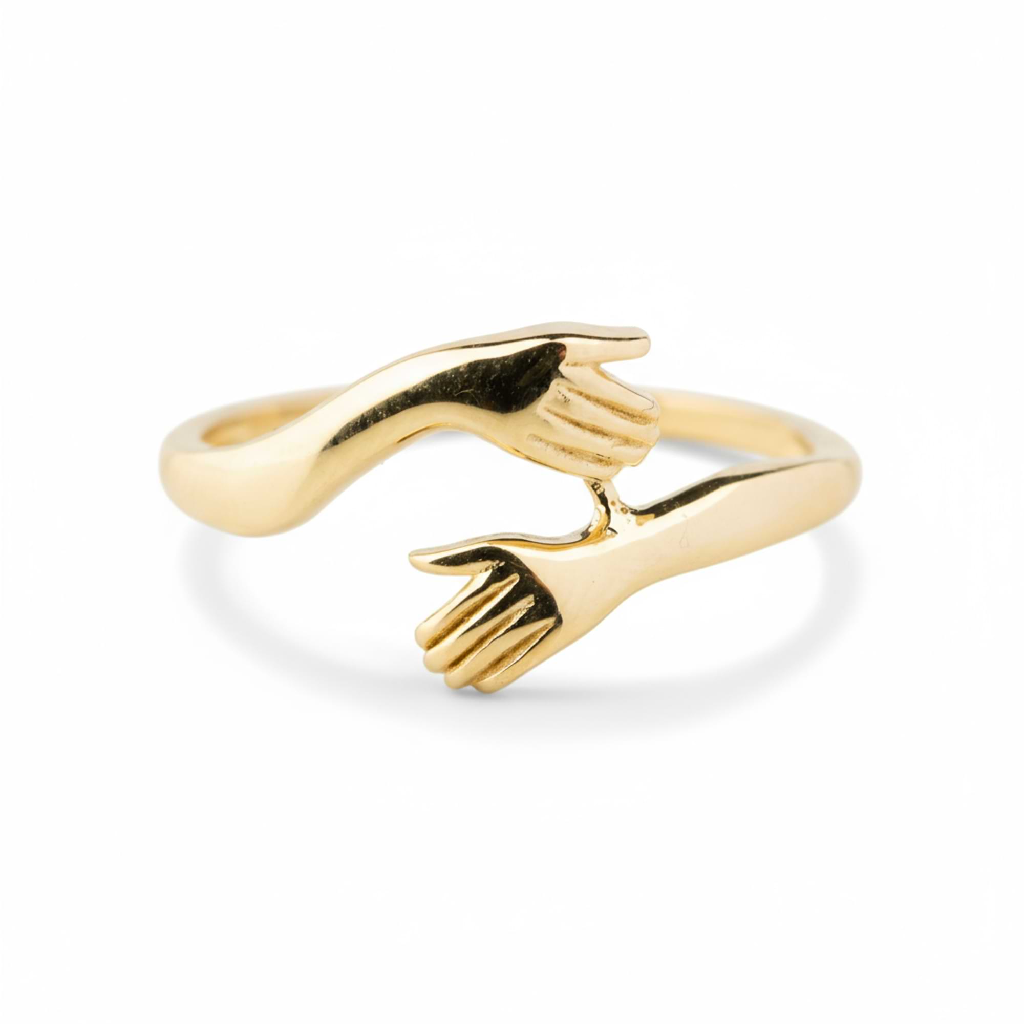 14k Gold Hugging ring with two interlocking hands on a white background