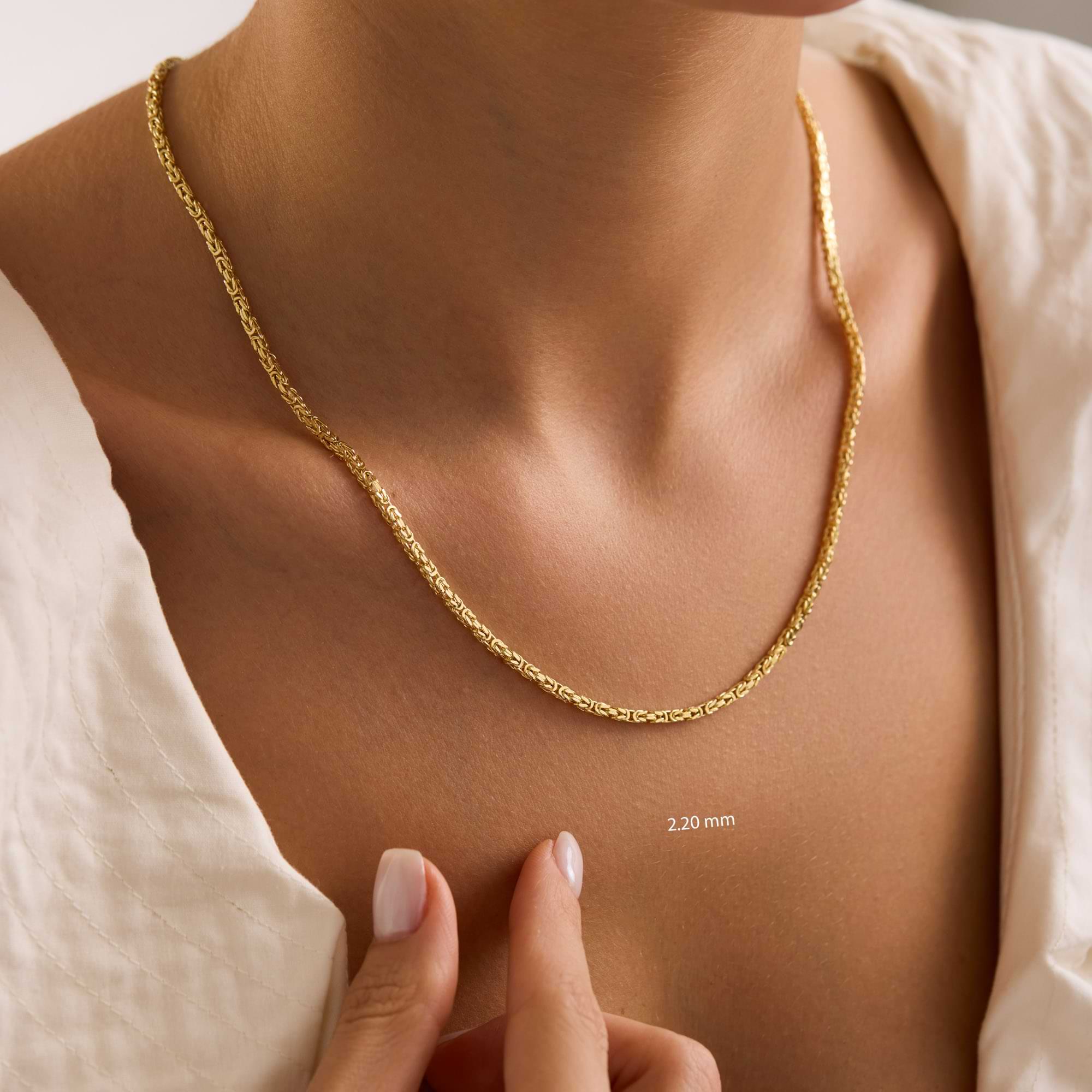 Gold 2.2mm byzantine necklace on a ladies neck