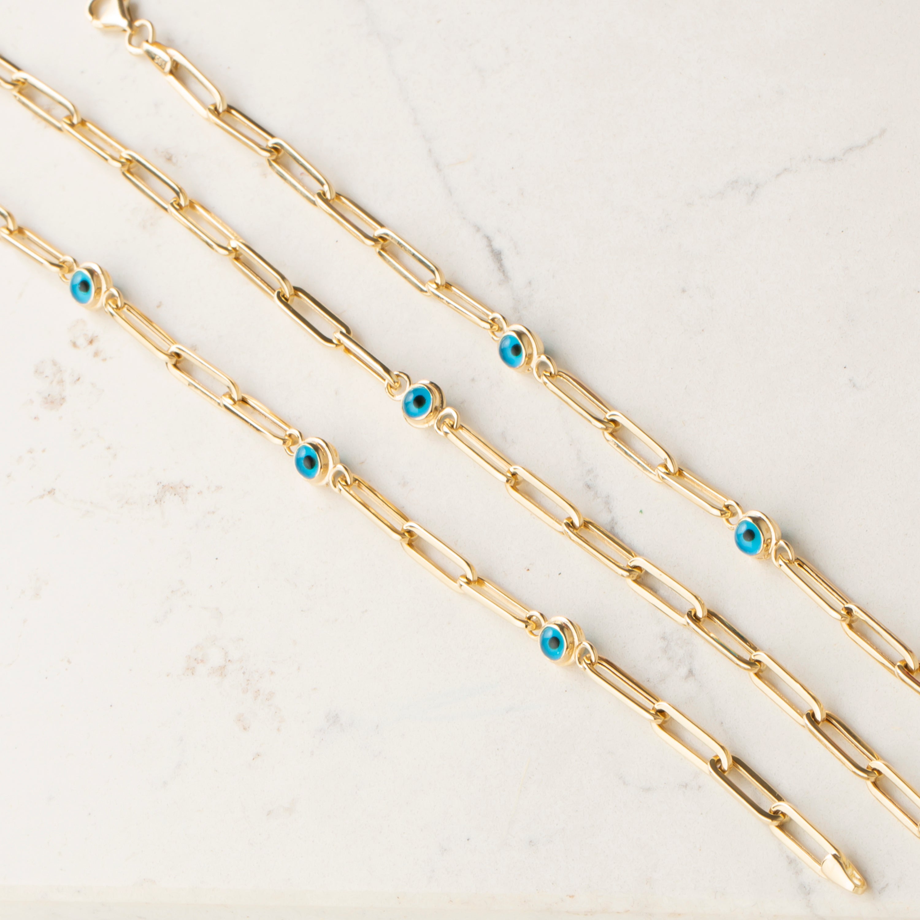 14K Gold Paperclip Chain Bracelet with Evil Eye Charm - Contemporary and Symbolic Jewelry